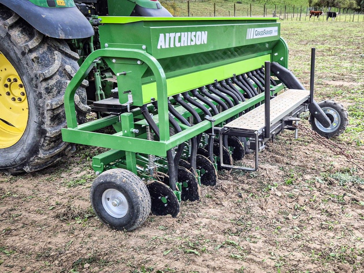 Aitchison GrassFarmer disc seed drill in paddock with drilling depth adjusted to suit conditions