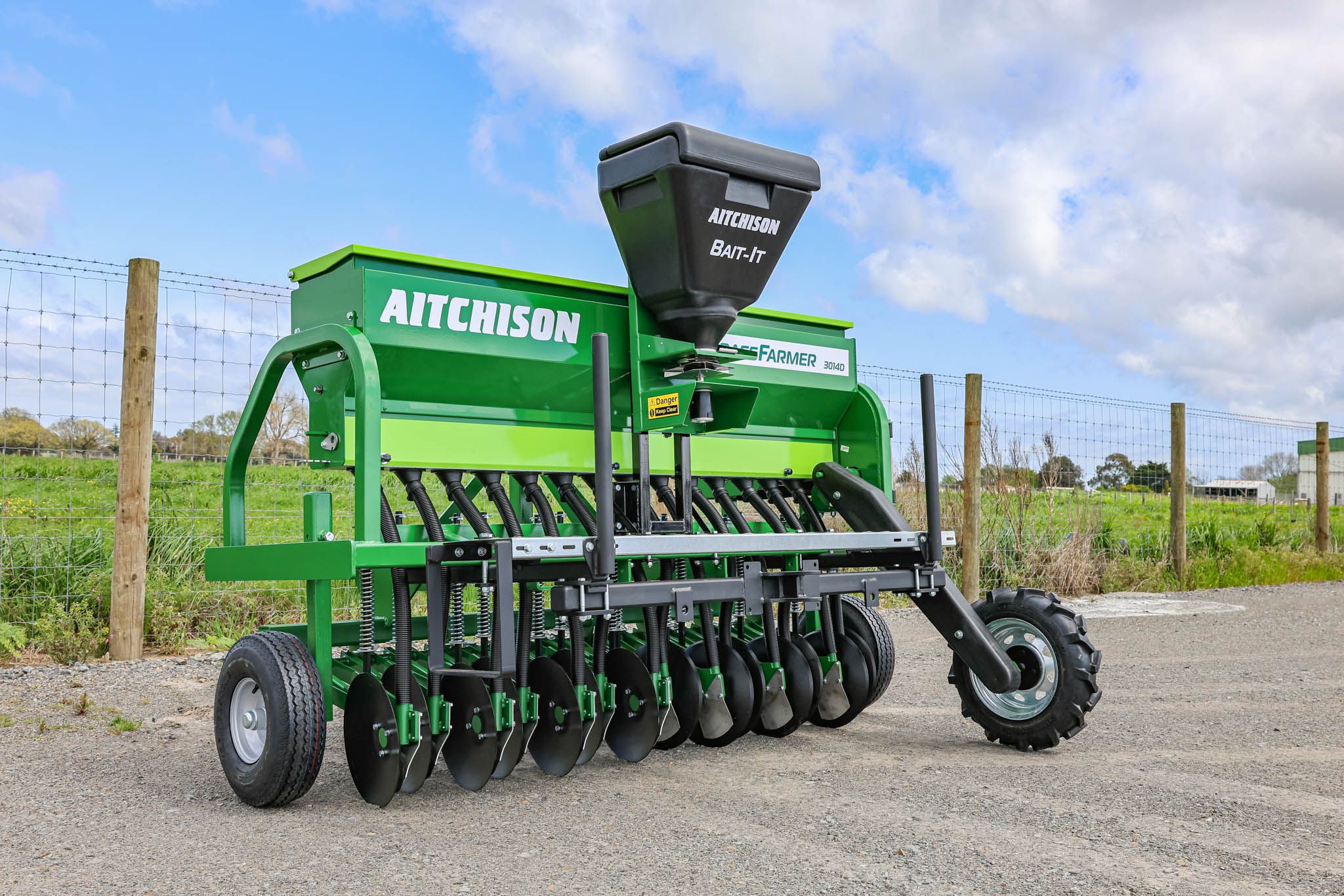 GrassFarmer® tine seed drill fitted with full accessory range including Tread Board, BAIT-IT applicator, and HD Cover Harrows.