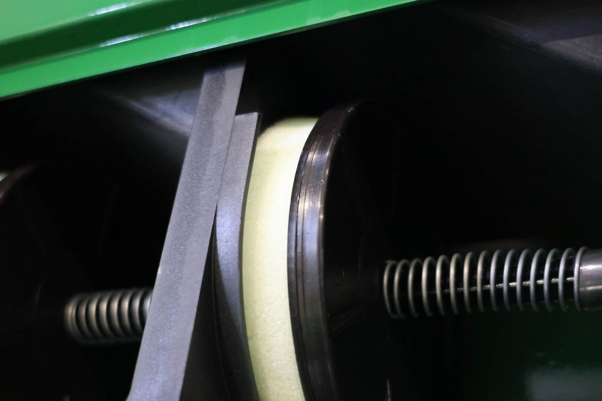 "Close-up of the GrassFarmer® tine seed drill foam pad seed delivery system.