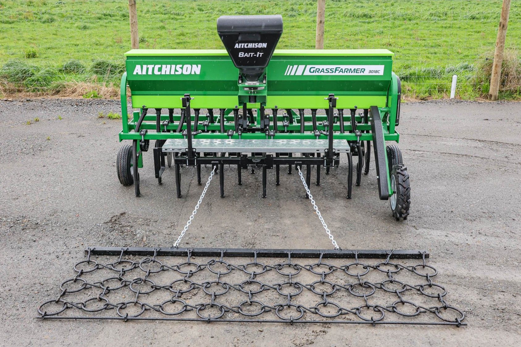 GrassFarmer® tine seed drill fitted with full accessory range including Tread Board, BAIT-IT applicator, and HD Cover Harrows.