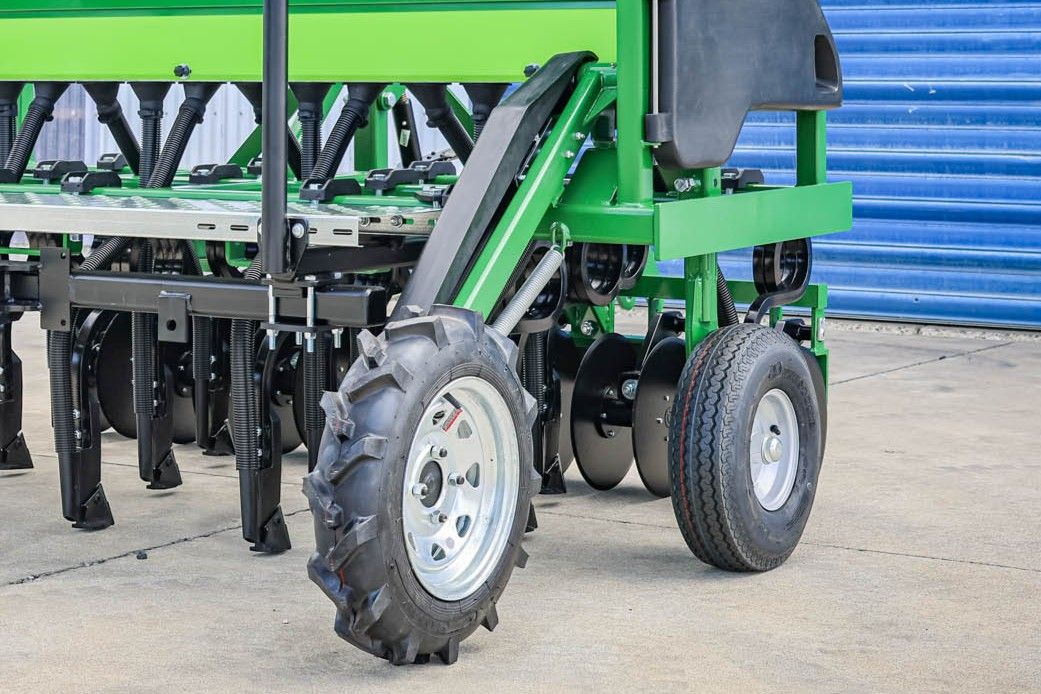 Close-up of GrassFarmer® sprung metering wheel for consistent ground contact and accurate seed rate on uneven terrain.